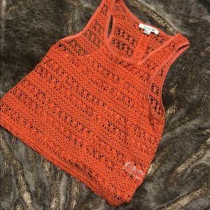 Orange knitted tank top.